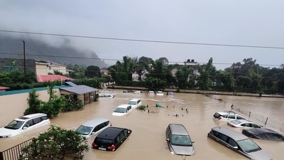 Uttarakhand Congress and AAP said the PS Dhami-led BJP government should have taken proactive steps after IMD’s weather forecast. In this photo, submerged cars are seen at a flooded hotel resort at the Jim Corbett National Park in Uttarakhand on Tuesday. (AP) Uttarakhand Congress and AAP said the PS Dhami-led BJP government should have taken proactive steps after IMD’s weather forecast. In this photo, submerged cars are seen at a flooded hotel resort at the Jim Corbett National Park in Uttarakhand on Tuesday. (AP)