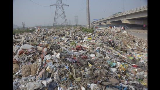 NHAI officials said that they have sent written communications to the district officials and the municipal corporation for the dumping at different underpasses, service roads and side lanes of the highway. (Sakib Ali/HT)