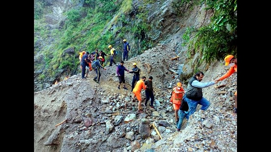 Stranded tourists being evacuated from the landslide-hit area of Khairna,Uttarakhand, on Wednesday. (PTI)