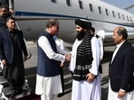 Afghanistan's foreign minister Amir Khan Muttaqi receiving Pakistan's foreign minister Shah Mahmood Qureshi at the Kabul airport. Afghanistan's foreign minister Amir Khan Muttaqi receiving Pakistan's foreign minister Shah Mahmood Qureshi at the Kabul airport.