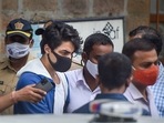 Bollywood actor Shah Rukh Khan's son Aryan Khan being taken to Arthur Road jail from the Narcotics Control Bureau (NCB) office after being arrested in connection with the alleged seizure of banned drugs from a cruise ship in Mumbai. Bollywood actor Shah Rukh Khan's son Aryan Khan being taken to Arthur Road jail from the Narcotics Control Bureau (NCB) office after being arrested in connection with the alleged seizure of banned drugs from a cruise ship in Mumbai. 