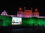 Red Fort in Delhi illuminated by the Archaeological survey of India on administration of 100 Crore Covid 19 vaccine doses.(HT Photo) Red Fort in Delhi illuminated by the Archaeological survey of India on administration of 100 Crore Covid 19 vaccine doses.(HT Photo)