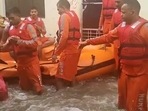 An NDRF team carries out rescue operations at several waterlogged areas in Rudrapur, Uttarakhand.(ANI Photo)