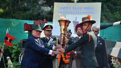 Indian Army officials with the victory torch in Shimla on Wednesday. (Deepak Sansta / Hindustan Times) Indian Army officials with the victory torch in Shimla on Wednesday. (Deepak Sansta / Hindustan Times)