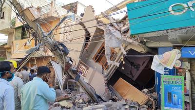 The two-storey building collapsed in Sangam Vihar. It was being lifted using jacks, officials said. Delhi Fire Services chief Atul Garg said no casualty has been reported in the incident. (HT Photo) The two-storey building collapsed in Sangam Vihar. It was being lifted using jacks, officials said. Delhi Fire Services chief Atul Garg said no casualty has been reported in the incident. (HT Photo)