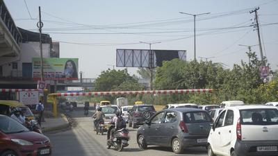 Height barriers have been put up at two locations on the Link Road stretching from Dabur crossing to Maharajpur border (Kaushambi-Anand Vihar) to prevent the entry of heavy vehicles. (Sakib Ali/HT Photo) Height barriers have been put up at two locations on the Link Road stretching from Dabur crossing to Maharajpur border (Kaushambi-Anand Vihar) to prevent the entry of heavy vehicles. (Sakib Ali/HT Photo)
