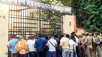 People and security personnel outside court during a hearing in the Lakhimpur Kheri case. (PTI FILE PHOTO) People and security personnel outside court during a hearing in the Lakhimpur Kheri case. (PTI FILE PHOTO)