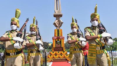 Police personnel pay tribute to martyrs on the occasion of the 62nd Police Commemoration Day. (PTI Photo) Police personnel pay tribute to martyrs on the occasion of the 62nd Police Commemoration Day. (PTI Photo)