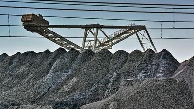 Coal piles at the Phola coal processing plant in Ogies, South Africa. Bloomberg Coal piles at the Phola coal processing plant in Ogies, South Africa. Bloomberg