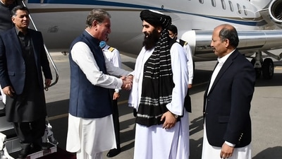 Afghanistan's acting Foreign Minister Amir Khan Muttaqi (2R) receiving Pakistan's Foreign Minister Shah Mahmood Qureshi (3L) upon his arrival at the airport in Kabul. (AFP) Afghanistan's acting Foreign Minister Amir Khan Muttaqi (2R) receiving Pakistan's Foreign Minister Shah Mahmood Qureshi (3L) upon his arrival at the airport in Kabul. (AFP)