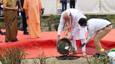Prime Minister Narendra Modi plants a Bodhi tree sapling ahead of an event marking Abhidhamma Day at Mahaparinirvana Temple, in Kushinagar on October 20. (ANI/ PIB)