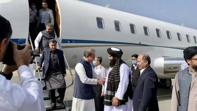 Taliban foreign minister Amir Khan Mutaqqi greets Pakistan foreign minister Shah Mahmood Qureshi. Lt General Faiz Hameed who is still functioning as DG, Inter-Services Intelligence, can be seen behind Qureshi. Taliban foreign minister Amir Khan Mutaqqi greets Pakistan foreign minister Shah Mahmood Qureshi. Lt General Faiz Hameed who is still functioning as DG, Inter-Services Intelligence, can be seen behind Qureshi.