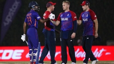 India's Hardik Pandya, left, greets England players at the end of the Cricket Twenty20 World Cup warm-up match between India and England in Dubai, UAE, Monday, Oct. 18, 2021. (AP Photo/Aijaz Rahi) (AP) India's Hardik Pandya, left, greets England players at the end of the Cricket Twenty20 World Cup warm-up match between India and England in Dubai, UAE, Monday, Oct. 18, 2021. (AP Photo/Aijaz Rahi) (AP)