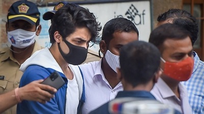 File image of Bollywood actor Shah Rukh Khan's son Aryan Khan being taken to Arthur Road jail from the NCB office. (PTI) File image of Bollywood actor Shah Rukh Khan's son Aryan Khan being taken to Arthur Road jail from the NCB office. (PTI)