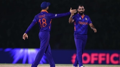 Virat Kohli celebrates with Mohammed Shami (BCCI)