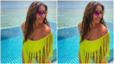 She teamed it with a pair of denim shorts as she smiled with all her heart for the pictures. (Instagram/@bipashabasu) She teamed it with a pair of denim shorts as she smiled with all her heart for the pictures. (Instagram/@bipashabasu)
