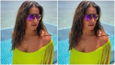 Bipasha accessorised her look for her day out with the sea and the sun with tinted shades. (Instagram/@bipashabasu) Bipasha accessorised her look for her day out with the sea and the sun with tinted shades. (Instagram/@bipashabasu)