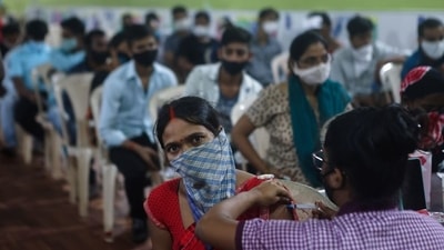 A woman receives a dose of Covishield vaccine in Mumbai. (Reuters File Photo)