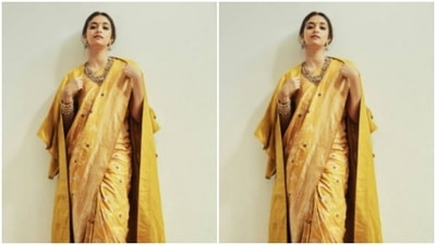 In a stunning shot, Keerthy styled her six yards of grace with an oversized yellow blazer. We are drooling. “Vintage yellove,” she wrote in her caption. (Instagram/@keerthysureshofficial) In a stunning shot, Keerthy styled her six yards of grace with an oversized yellow blazer. We are drooling. “Vintage yellove,” she wrote in her caption. (Instagram/@keerthysureshofficial)