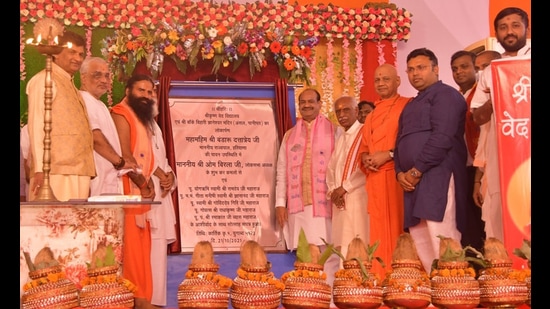 Lok Sabha speaker Om Birla, Haryana governor Bandaru Dattatreya, Yoga guru Baba Ramdev, BJP Karnal MP Sanjay Bhatia and other BJP leaders were present at the event in Panipat on Thursday. (HT Photo)