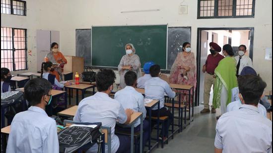 The CCPCR team conducting an inspection at Government Model Senior Secondary School in Sector 45 on Thursday. (HT Photo)