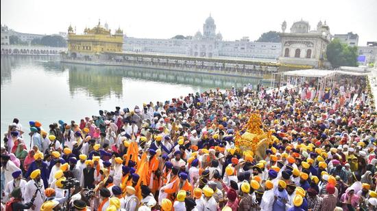 The Golden Temple saw the largest footfall of 1.5 lakh on Thursday, according to authorities; the Parkash Purb on Friday and the nagar kirtan proved major attractions. (Sameer Sehgal/HT)
