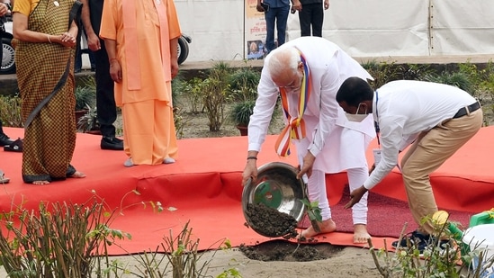Prime Minister Narendra Modi plants a Bodhi tree sapling ahead of an event marking Abhidhamma Day at Mahaparinirvana Temple, in Kushinagar on October 20.(ANI/ PIB)