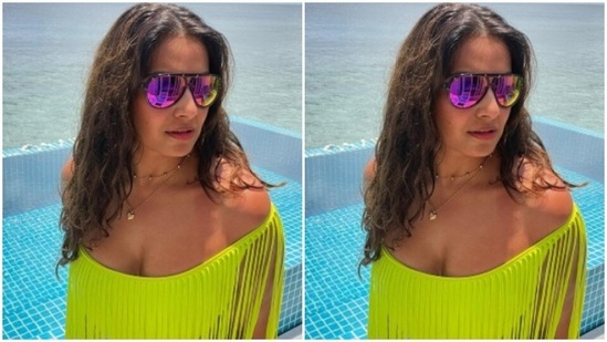 Bipasha accessorised her look for her day out with the sea and the sun with tinted shades.(Instagram/@bipashabasu)
