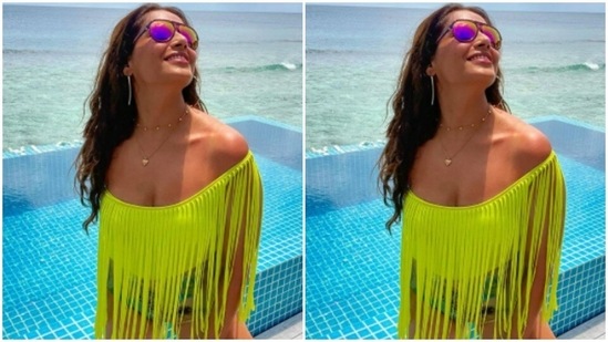 In beach wavy curls, Bipasha left her tresses open to play in the wind from the sea.(Instagram/@bipashabasu)