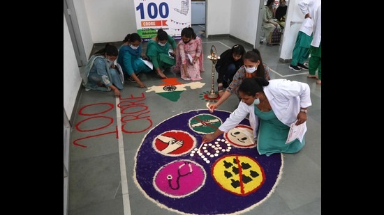 The vaccination site in GMCH-32, Chandigarh, being decorated with rangoli to celebrate the occasion of India crossing the one billion Covid vaccination mark. (HT Photo)