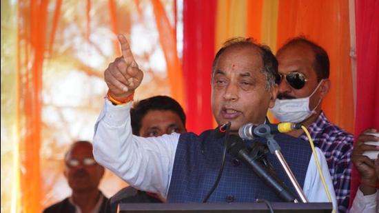 HP chief minister Jai Ram Thakur addressing a rally at Saroa in Seraj area of Mandi district on Wednesday. (Birbal Sharma/HT)
