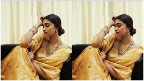 In a yellow and white saree from the house of fashion designer Kasturi Kundal, Keerthy posed on a couch and defined elegance for us.(Instagram/@keerthysureshofficial)
