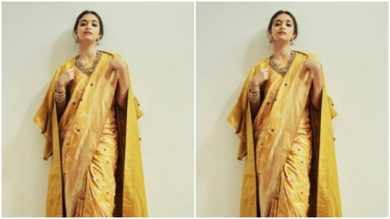 In a stunning shot, Keerthy styled her six yards of grace with an oversized yellow blazer. We are drooling. “Vintage yellove,” she wrote in her caption.(Instagram/@keerthysureshofficial)