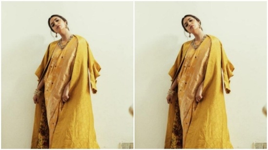 The saree is printed in maroon floral motifs. Keerthy teamed it with a printed oversized blazer as she posed in an indoor setup.(Instagram/@keerthysureshofficial)