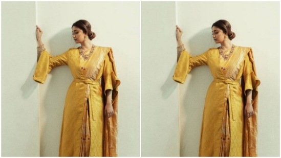 She wore her oversized jacket with frill sleeves with her saree and posed like a boss lady.(Instagram/@keerthysureshofficial)
