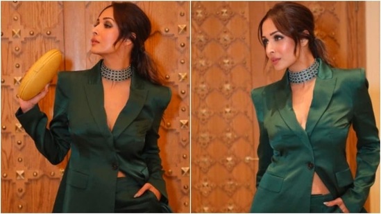 Malaika Arora redefined elegance in this satin emerald green pantsuit. She was styled by celebrity stylist Tanya Ghavri.(Instagram/@malaikaaroraofficial)