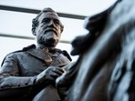 The 1935 statue of Confederate Gen. Robert E. Lee, by sculptor Alexander Phimister, sits in storage at Hensley Field, the former Naval Air Station on the west side of Mountain Creek Lake in Dallas. The statue of Lee, which the city of Dallas removed from a park and later sold in an online auction, is now on display at a golf resort in West Texas, the Houston Chronicle reported (Ashley Landis/The Dallas Morning News via AP, File) The 1935 statue of Confederate Gen. Robert E. Lee, by sculptor Alexander Phimister, sits in storage at Hensley Field, the former Naval Air Station on the west side of Mountain Creek Lake in Dallas. The statue of Lee, which the city of Dallas removed from a park and later sold in an online auction, is now on display at a golf resort in West Texas, the Houston Chronicle reported (Ashley Landis/The Dallas Morning News via AP, File)