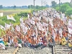 Farmers block railway tracks as part of the Samyukt Kisan Morcha's ‘rail roko’ protests in Amritsar.(HT Photo) Farmers block railway tracks as part of the Samyukt Kisan Morcha's ‘rail roko’ protests in Amritsar.(HT Photo)