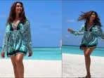 Bipasha Basu looks brighter than Maldives sky in <span class='webrupee'>₹</span>13k turquoise draped dress(Instagram/bipashabasu) Bipasha Basu looks brighter than Maldives sky in <span class='webrupee'>₹</span>13k turquoise draped dress(Instagram/bipashabasu)