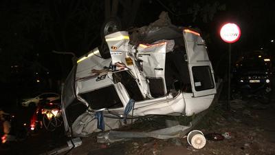 At least three persons were killed and 12 others sustained injuries when a tanker containing thinner brushed a car and rammed into an empty container near Navale bridge on Katraj-Mumbai road on Friday evening, officials said. (Ravindra Joshi/HT PHOTO) At least three persons were killed and 12 others sustained injuries when a tanker containing thinner brushed a car and rammed into an empty container near Navale bridge on Katraj-Mumbai road on Friday evening, officials said. (Ravindra Joshi/HT PHOTO)