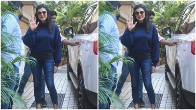 Sushmita teamed her black top with a cropped navy blue sweatshirt and a pair of dark blue jeans. (HT Photos/Varinder Chawla) Sushmita teamed her black top with a cropped navy blue sweatshirt and a pair of dark blue jeans. (HT Photos/Varinder Chawla)