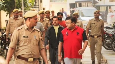Ashish MIshra and other accused being taken to court in the Lakhimpur Kheri violence case on Friday. (PTI PHOTO) Ashish MIshra and other accused being taken to court in the Lakhimpur Kheri violence case on Friday. (PTI PHOTO)