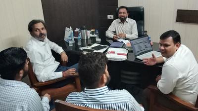A vigilance team from the local bodies department meeting the executive officer of Sangrur nagar council on Friday. (HT Photo)