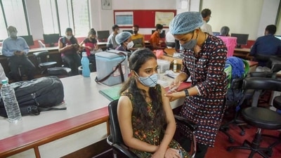 A beneficiary receives a dose of Covid-19 vaccine in Navi Mumbai on Friday. The Centre has written to states over delay in administering the second dose of the vaccine. (PTI) A beneficiary receives a dose of Covid-19 vaccine in Navi Mumbai on Friday. The Centre has written to states over delay in administering the second dose of the vaccine. (PTI)