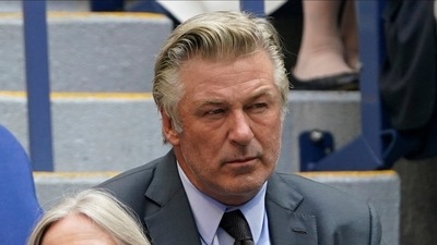 Alec Baldwin during the men's singles final of the US Open tennis championships, (AP Photo/John Minchillo) (AP) Alec Baldwin during the men's singles final of the US Open tennis championships, (AP Photo/John Minchillo) (AP)