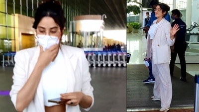 Janhvi Kapoor has been making sure she wears the mask everytime she steps out. After asking father Boney Kapoor not to remove mask to pose for pictures few days before, she was seen putting on a mask as soon as she stepped out of the car and was captured by the paparazzi. (Varinder Chawla) Janhvi Kapoor has been making sure she wears the mask everytime she steps out. After asking father Boney Kapoor not to remove mask to pose for pictures few days before, she was seen putting on a mask as soon as she stepped out of the car and was captured by the paparazzi. (Varinder Chawla)