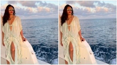 Bipasha opted for a kaftan maxi set. The dress, teamed with a white and blue bralette, is flowy and perfect for a beach vacation. (Instagram/@bipashabasu) Bipasha opted for a kaftan maxi set. The dress, teamed with a white and blue bralette, is flowy and perfect for a beach vacation. (Instagram/@bipashabasu)