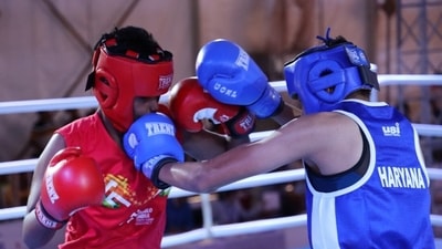 Haryana's Jaismine (in blue) punches her opponent Chattishgarh's Rajbala during 60kg opening round match on Day 2 at the 5th Elite Women's National Boxing Championships in Hisar on Friday October 22, 2021 (BFI)
