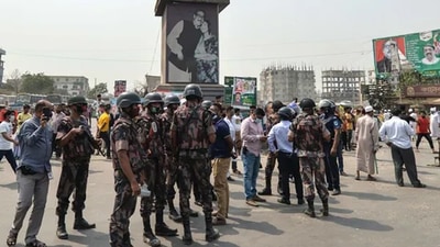 The violence took place in Bangladesh during the Durga Puja festival following a social media post about the alleged desecration of the Quran at a Durga Puja pandal in Comilla district (AFP)