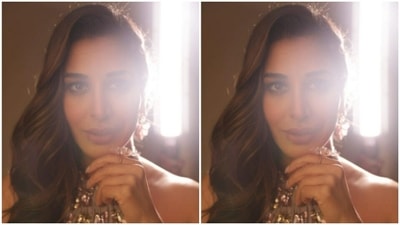 She opted for a minimal makeup look – nude eyeshadow, mascara-laden eyelashes, drawn eyebrows, contoured cheeks and a shade of maroon lipstick. (Instagram/@sophiechoudry)